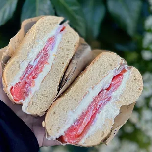 BYO Bagel Sandwich: Sesame Bagel, toasted ($3) w/ pink label cream cheese ($2), nova lox ($9.50), red onions (50 cents) = $15