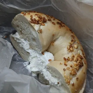 Garlic bagel with scallion cream cheese.  (Perfect combo)