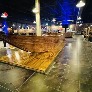 a wooden boat on display