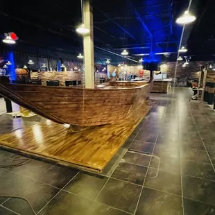 a wooden boat on display