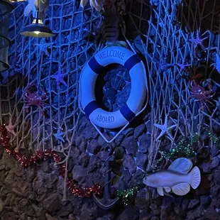 a life preserver on a rock wall