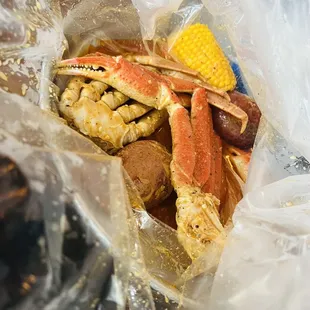 crab legs and corn on the cob