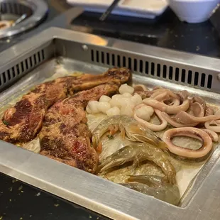 Short ribs, shrimp, scallops, and squid