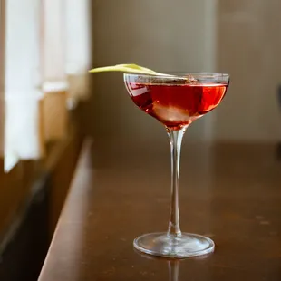 a cocktail in a coupe glass