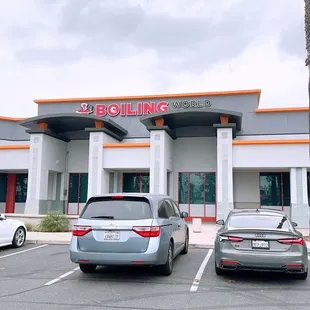 cars parked in front of a building