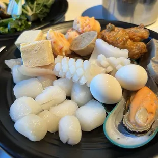Assorted seafood and quail eggs from the buffet.