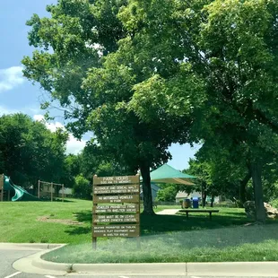 Playground, picnic shelter, and tennis courts here; dog friendly (must be on leash and under your control at all times).