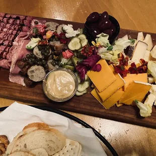 a platter of meat and cheese