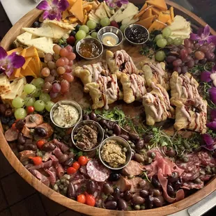 A giant board featuring Brie bites that was made for a party im assuming it looked great!