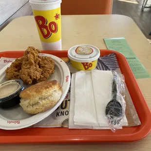 a tray of food and a drink