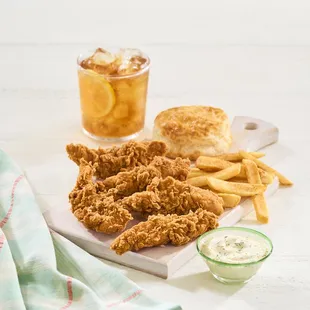 a plate of fried chicken and fries