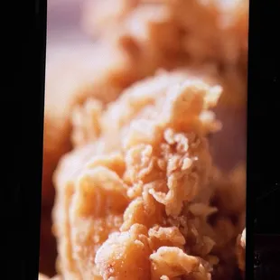a close up of a fried chicken