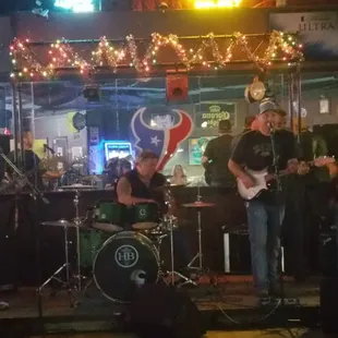 a band playing at a bar