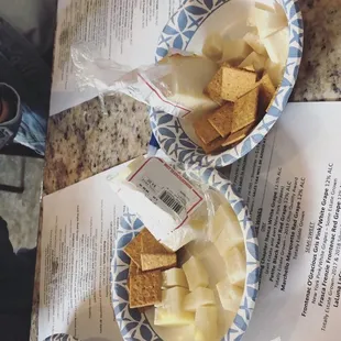 cheese and crackers on plates