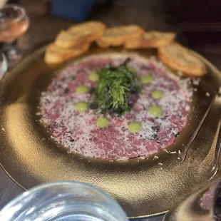Beef carpaccio - truffle, mint avocado crema, fried capers - 10/10