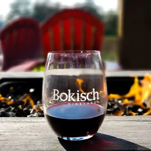 a glass of wine on a table