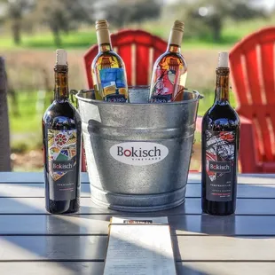 a bucket full of bottles of wine