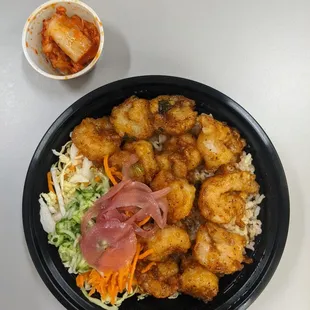Honey Garlic Shrimp with a mix of brown rice/salad. My grandparents immigrated here for a reason - to have these shrimps end up in my belly