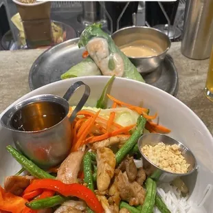 Chicken bún, with shrimp spring rolls.