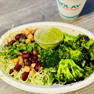 Regular bowl - cilantro noodles, forbidden rice, power beans, ginger broccoli and more cilantro!