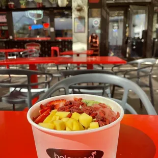 Açaí Bowl with Pitaya and Strawberry Sorbet, Topped with Goji Berries, Mango, Kiwi, and Strawberry Slices