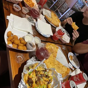 Chili fries, corn nuggets, Cajun fries, hot dog, cheese pizzas!