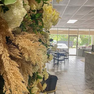 Our flower wall , come stop in and take a picture