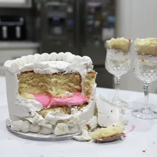 a piece of cake and a glass of wine