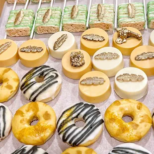Safari themed donuts, chocolate covered Oreos and rice krispy treats for a baby shower