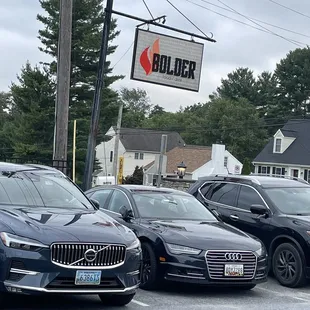 a lot of cars parked in a parking lot