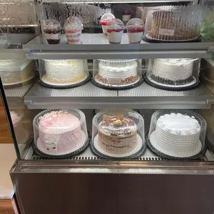a display of cakes and pastries
