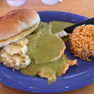 Chicken Poblano with rice and mashed potatoes
