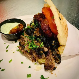 Build your own Arepa (steak, tomato, plantains, beans, grilled onions)