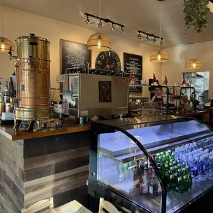 a coffee shop with a display case