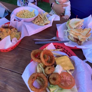 Top left to right-curly fries with chili cheese on it- kids mac n cheese- club sandwich &amp; frings with my burger