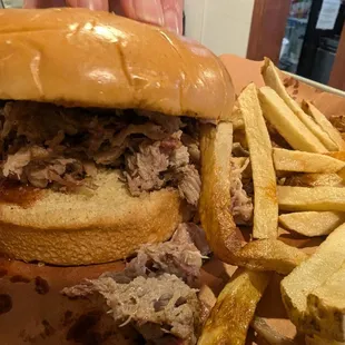 5 oz Pulled Pork sandwich. A bit dry. Get the brisket instead. Also skip the hand-cut fries, which were undercooked.