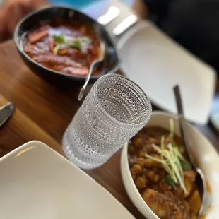 a plate of food and a glass of water