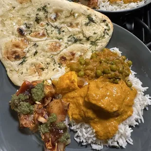 Plated meal at home (naan from Trader Joe's)