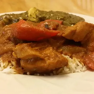 a plate of food with rice and vegetables