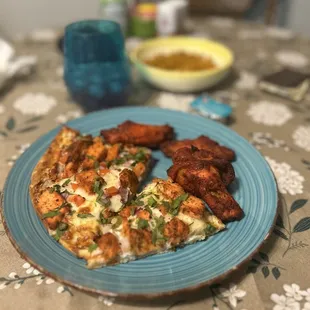 Tandoori chicken pizza and masala wings.