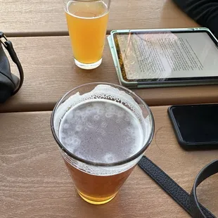 a pint of beer and a tablet