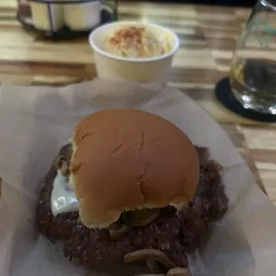 Mushroom Switzer burger with potato salad
