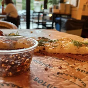 Ask for chilli flake. They don't have hot sauce but they have this