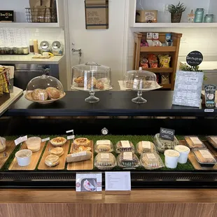 a counter with a variety of food items