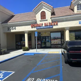 a car parked in front of the store