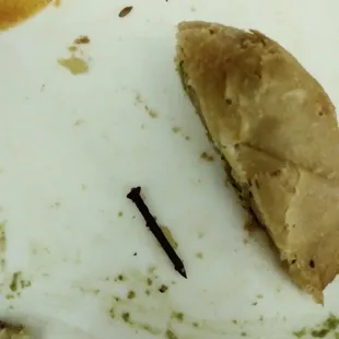 a piece of food left on a plate