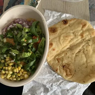 Tandoori Paneer bowl with garlic naan! Delicious flavors! Good food, fast! Bombay Burrito is  indeed!