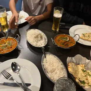 a table full of food and drinks