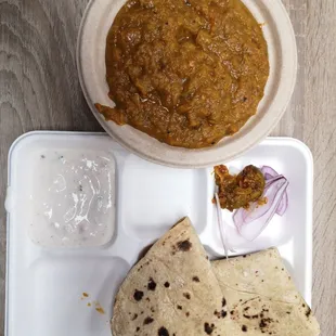 Baingan Bhartha. Vegan. Mashed eggplant with Indian bread