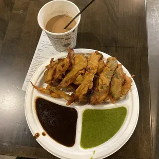 a plate of food and a cup of coffee